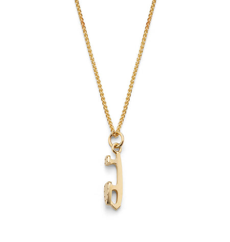 solid gold Ice Skating Necklace on a white background