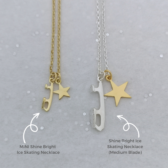 two necklaces featuring silver and gold stars and ice skate blades on a grey background