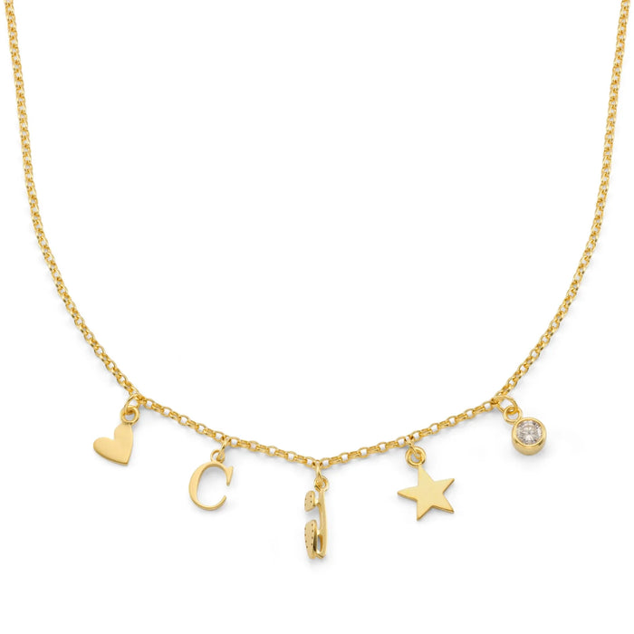 gold necklace with ice skating themed charms on a white background