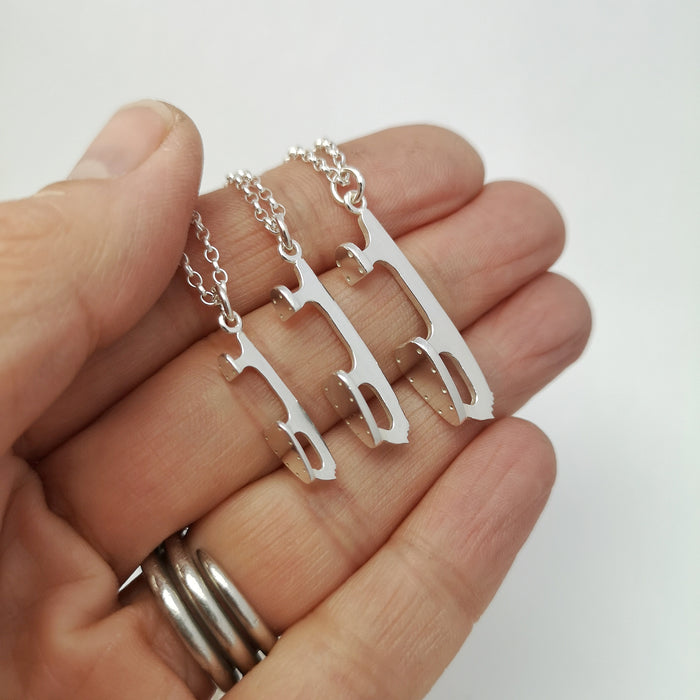 Silver Ice Skating Necklaces