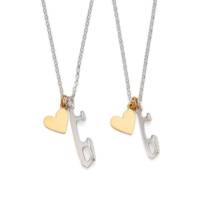 Two ice skating necklaces, one with a small silver skate blade charm and a gold-plated heart, the other with a medium silver skate blade charm and a gold-plated heart, displayed on white backgrounds.