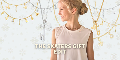 A woman in a light pink sleeveless top is shown from the waist up against a white background with snowflakes, gold and silver necklace garlands, and the text 'THE SKATERS GIFT EDIT' overlaid at the bottom.