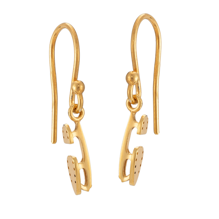 gold ice skate blade hook earrings on a white background