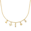 Gold necklace with various charms on a white background
