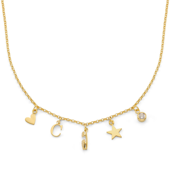 Gold necklace with various charms on a white background