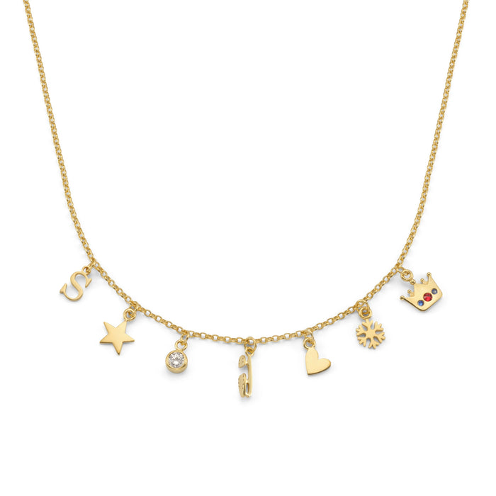 Gold necklace with various charms on a white background