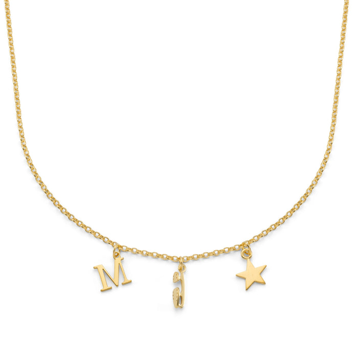 Gold necklace with 'M' , ice skate blade and star charms on a white background