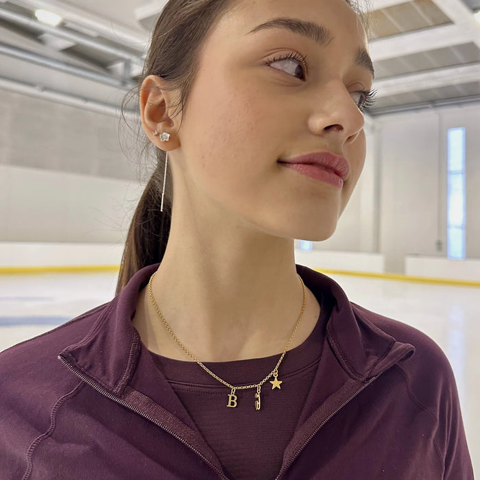 Gold Ice Skating Multi Charm Necklace