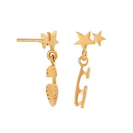 gold ice skate blade and star stud earrings on a white background