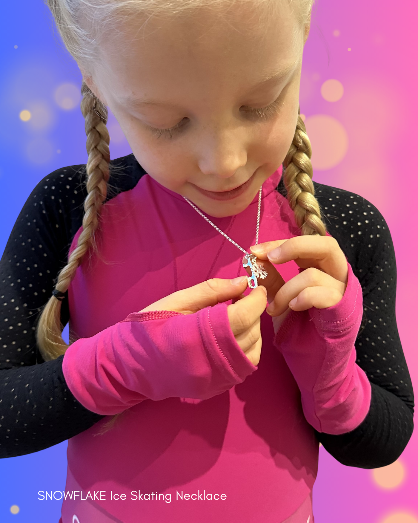 Figure skater looking at a Snowflake silver ice skating necklace