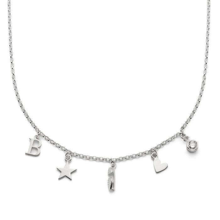Silver necklace with various charms on a white background