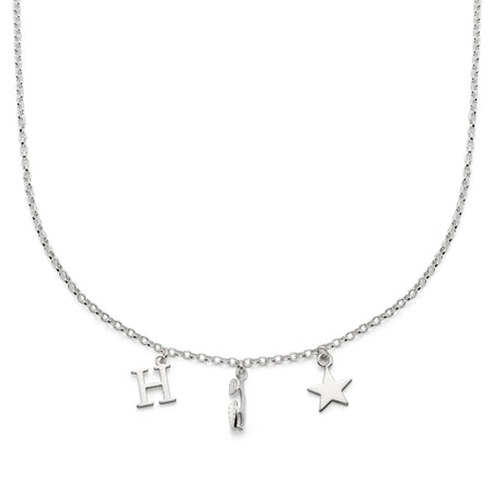 Silver necklace with 'H', ice skate blade, and star charms on a white background