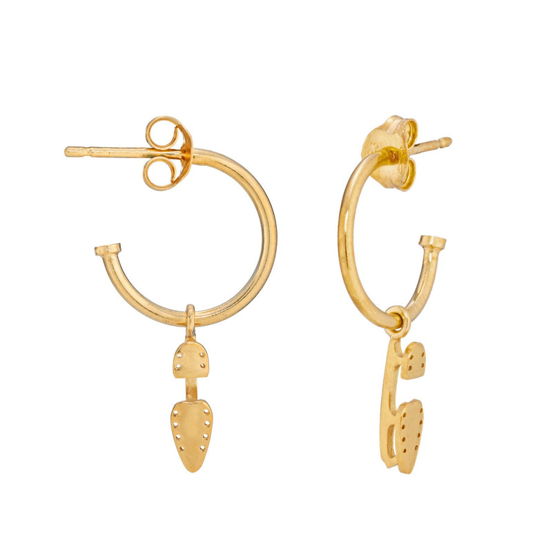 Gold Stud Hoop Earrings with old ice skate blade charms on a white background