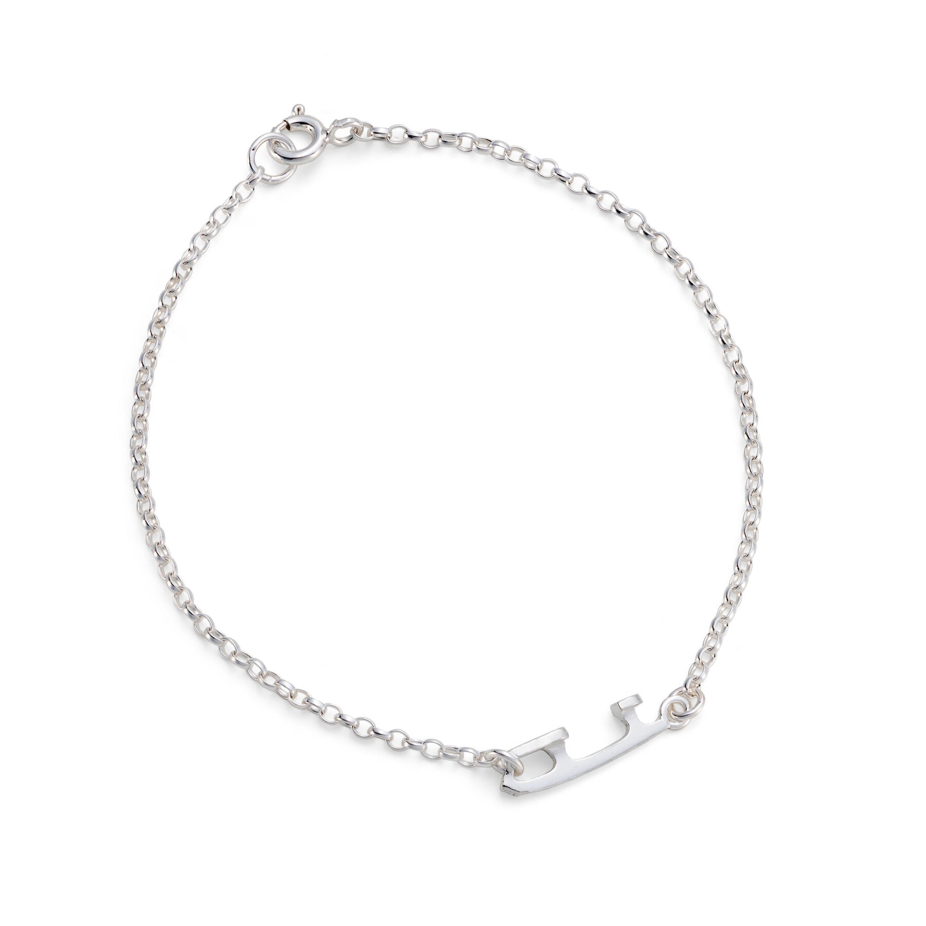 silver ice skating bracelet featuring a tiny ice skate blade on a white background